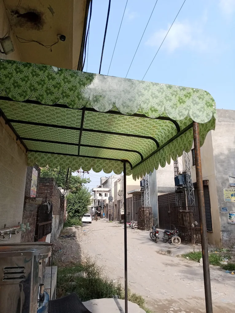 Fiber sheet canopy and steel shade structure in Lahore