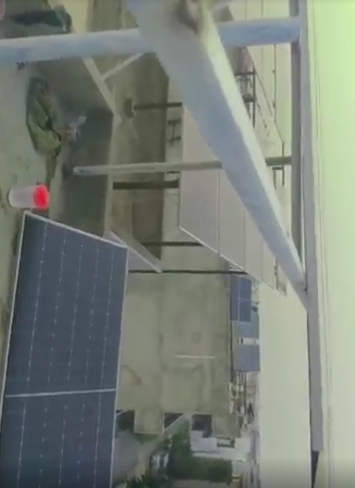 Installing solar panel frame on rooftop